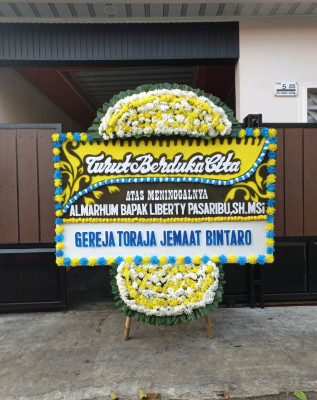 Papan Bunga Duka di Rongga